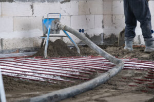 rsz semi dry floor screed a worker shovels a constru 2023 11 27 05 32 14 utc